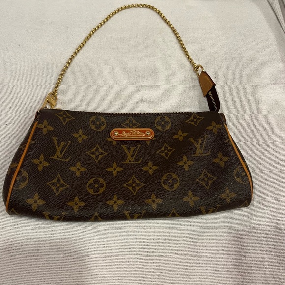 Authentic Louis Vuitton *vintage* hang bag. - Picture 1 of 7
